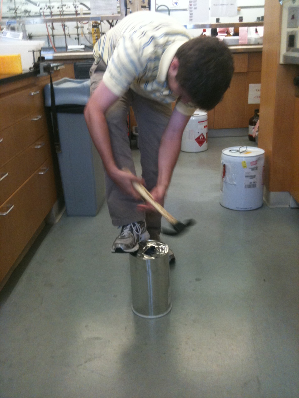 Stevie prying open a container